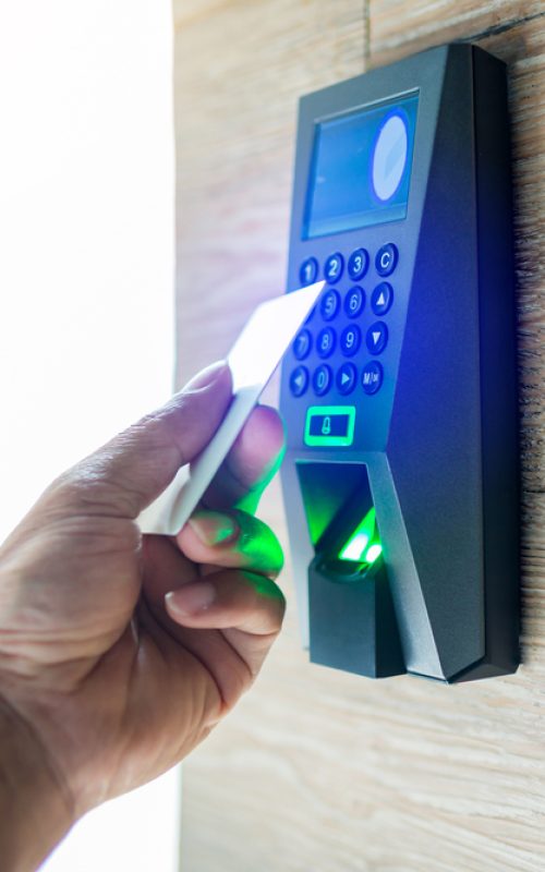 Door,Access,Control.,Staff,Holding,A,Key,Card,To,Lock